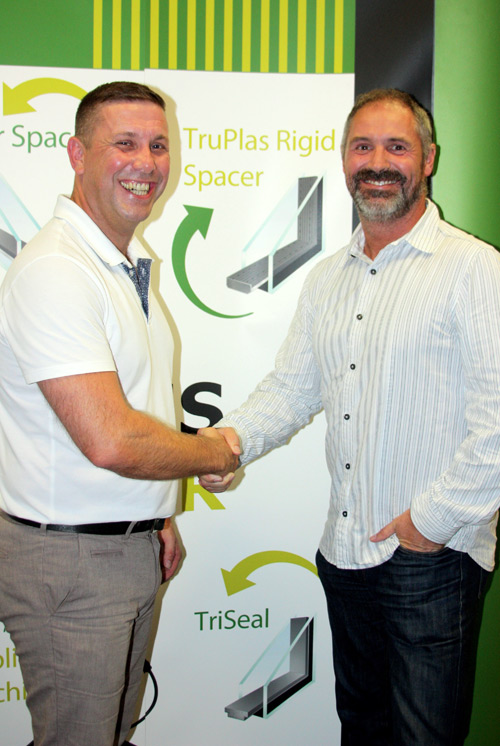 Andy Jones of Edgetech (l) Seals the Deal with Quickslide's Adrian Barraclough