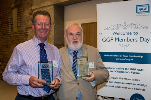 Brian Baker (left) and Brian Waldron receive their awards