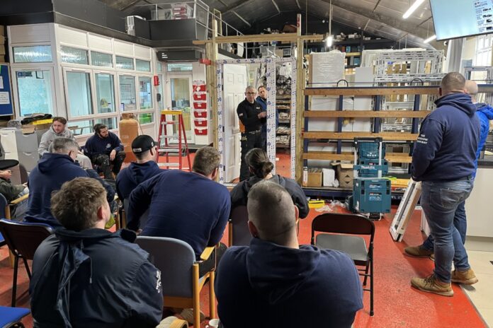 TWC323 Fitting teams at The Window Company (Contracts) receive fire door installation training from Solidcor 1 training